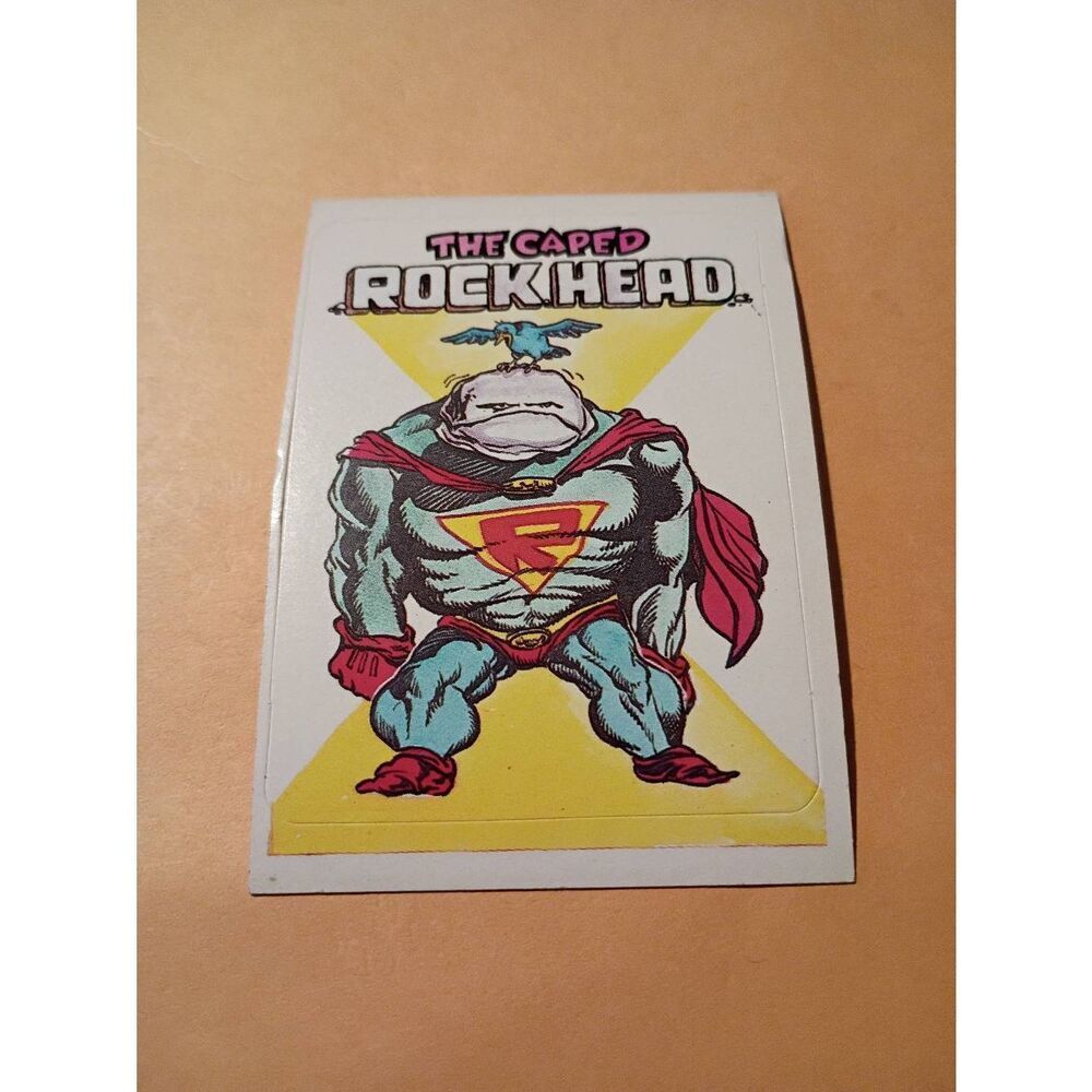 1983 General Mills Zero Hero Trading Card Sticker Vintage #63 Caped Rock Head